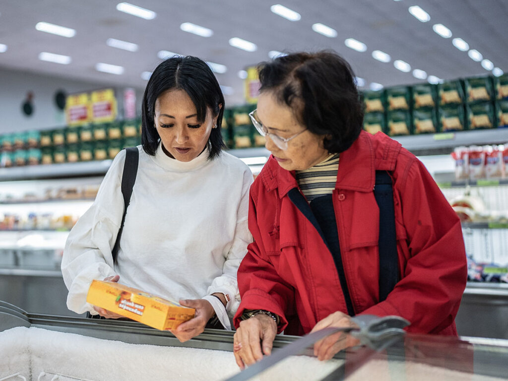 Two Women Checking Food Labels