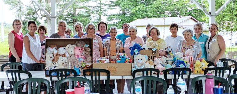 Crawford County Alpha Gamma Chapter of Delta Kappa Gamma posing with their toy donation.