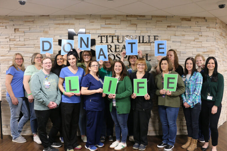 Titusville Area Hospital staff holding letters that spell "Donate Life"